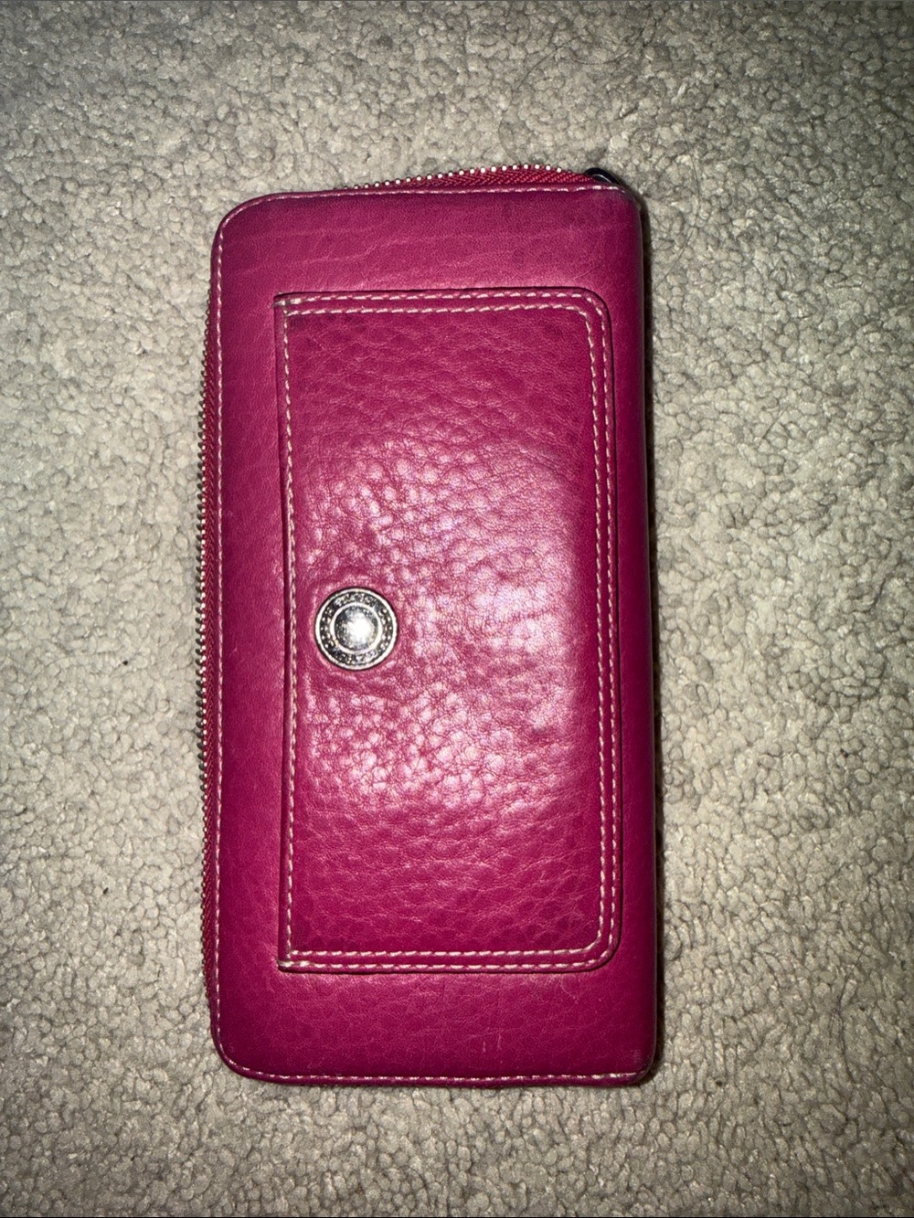Pink/fuchsia zip around Coach wallet